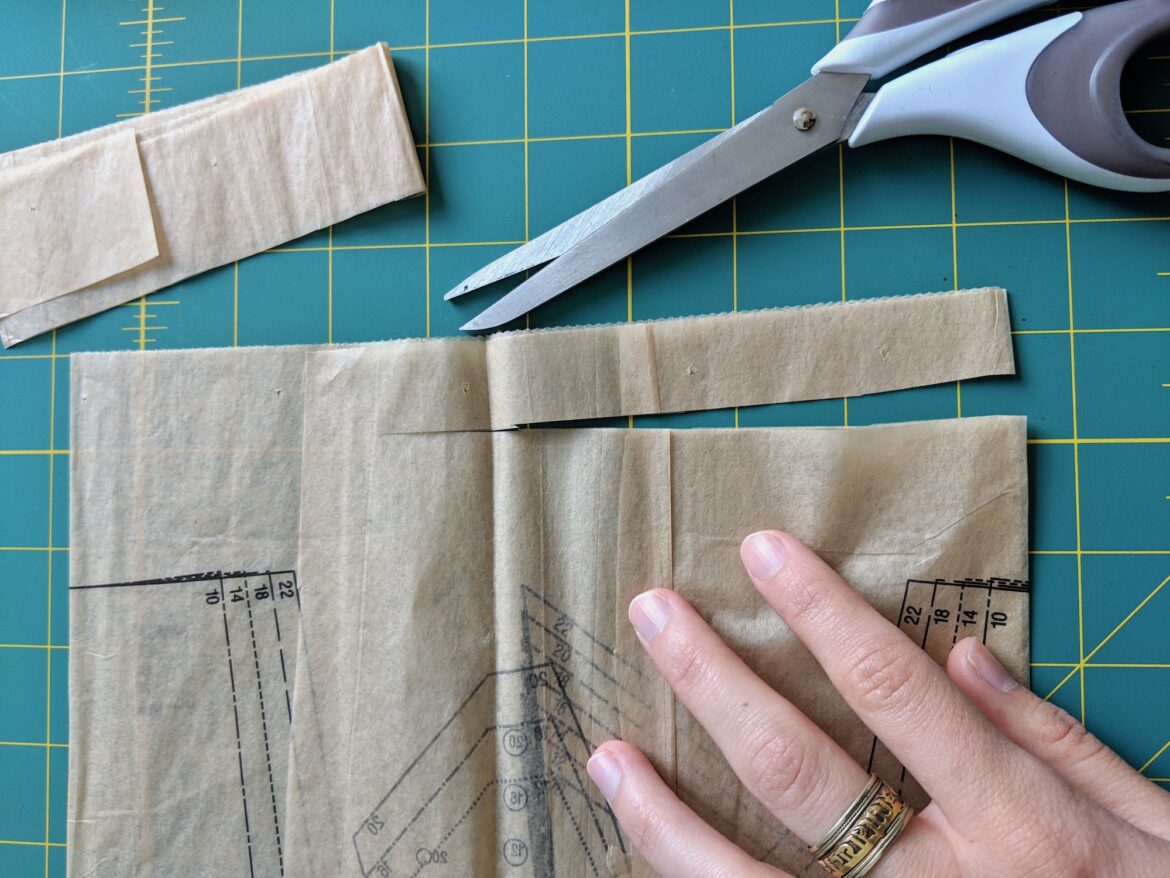 Cutting pattern paper to use as a stabiliser for fine fabrics